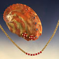 rubies & diamonds on abalone shell